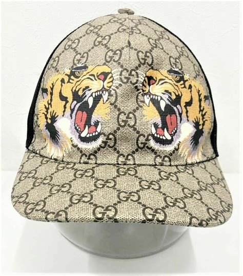 gucci tiger hat fake|Gucci tiger print bucket hat.